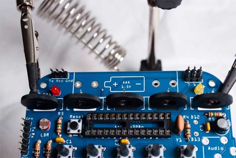 add the two LEDs. LED1 is red, and LED2 is yellow.